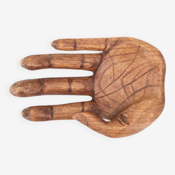 Empty wooden pocket in the shape of a hand, vintage