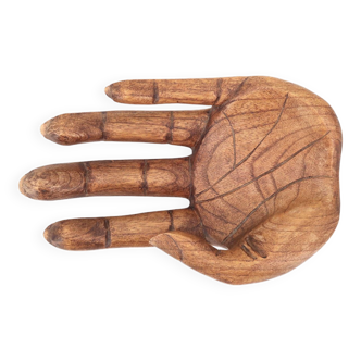 Empty wooden pocket in the shape of a hand, vintage