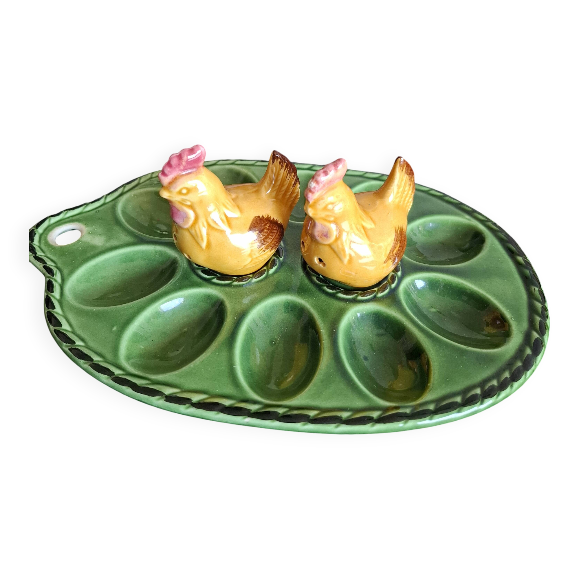 Earthenware egg dish with chicken-shaped salt and pepper shakers