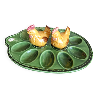 Earthenware egg dish with chicken-shaped salt and pepper shakers