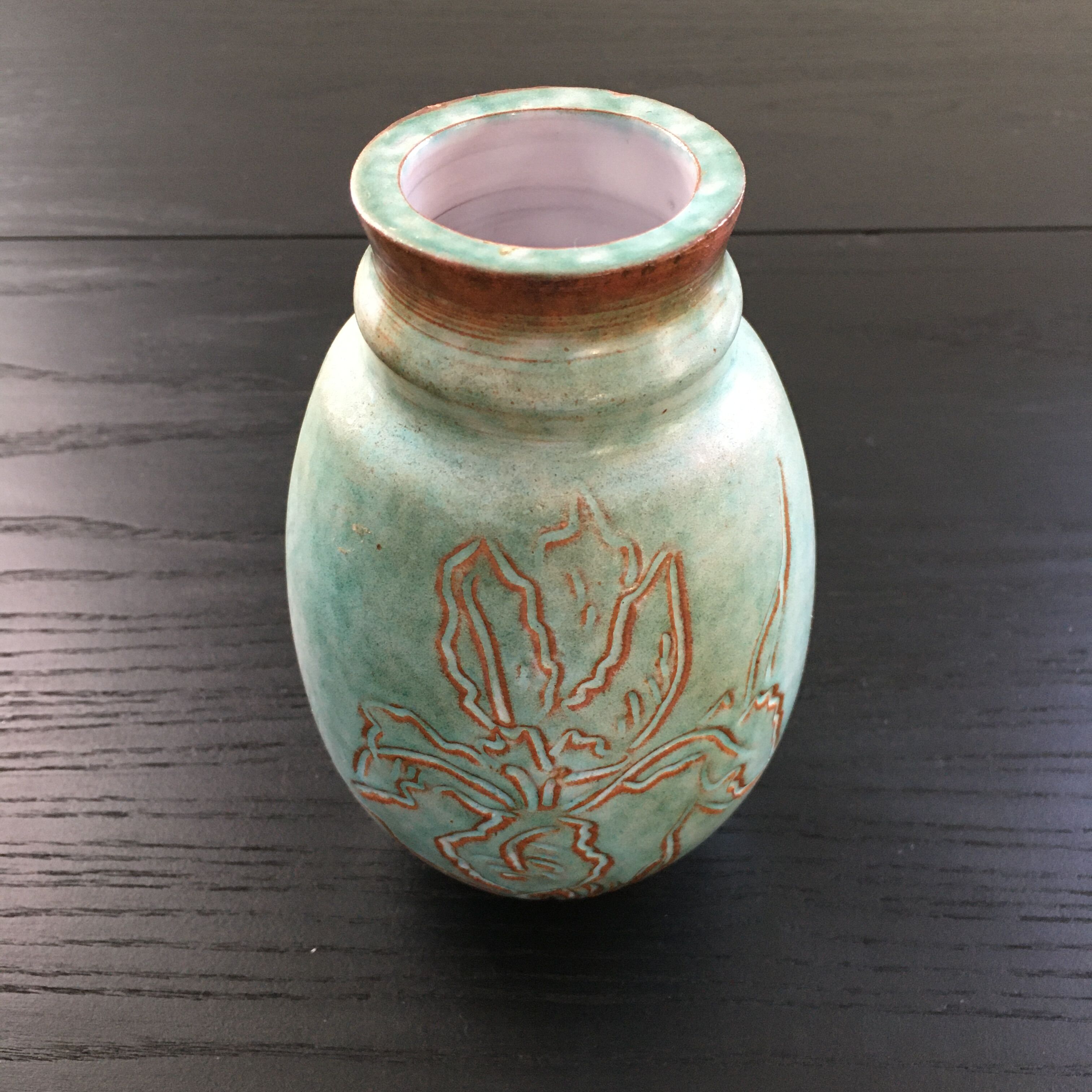 Turquoise vase with iris decoration