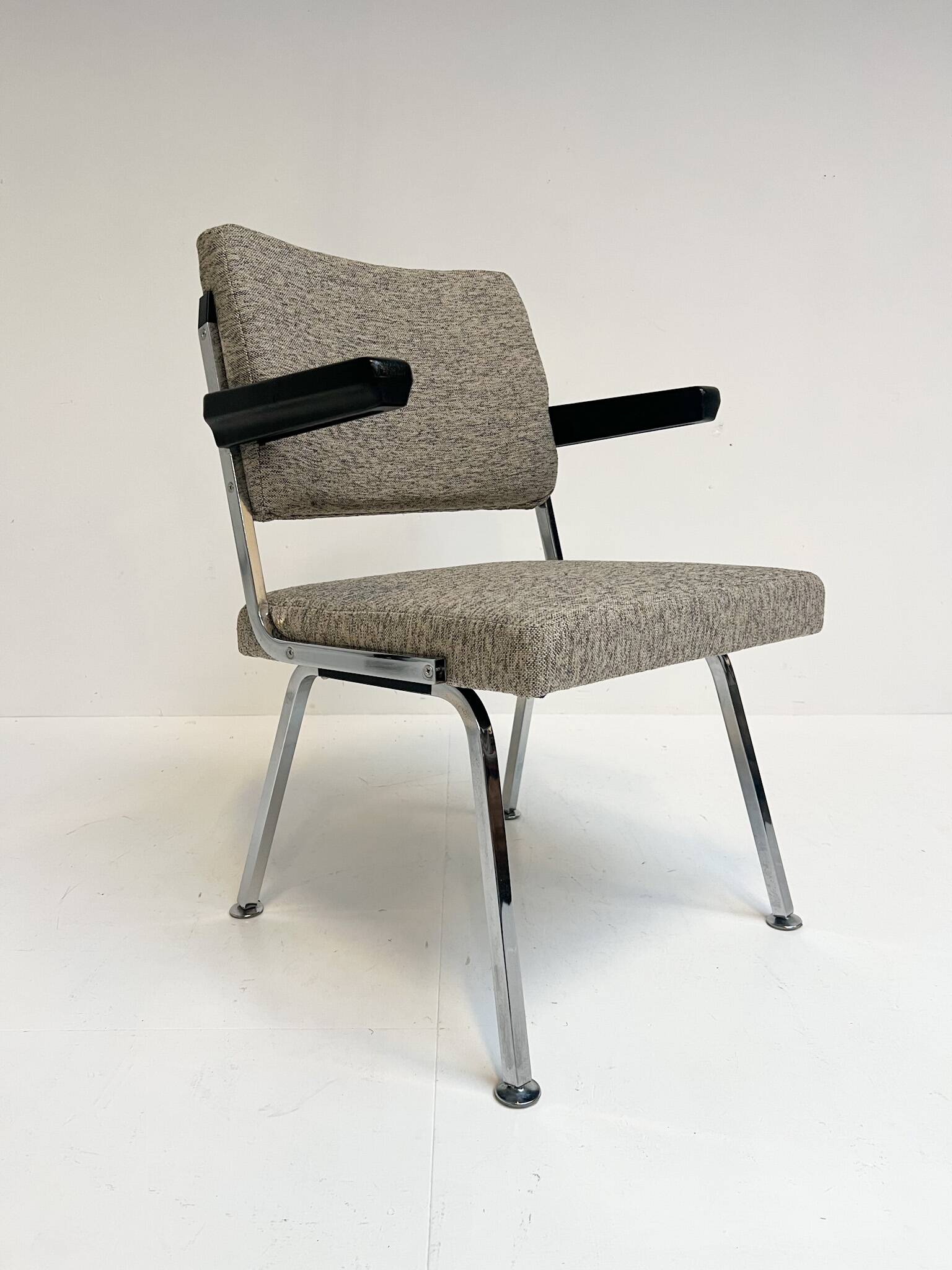 Gray upholstered designer armchair attributed to Gispen, 1960s