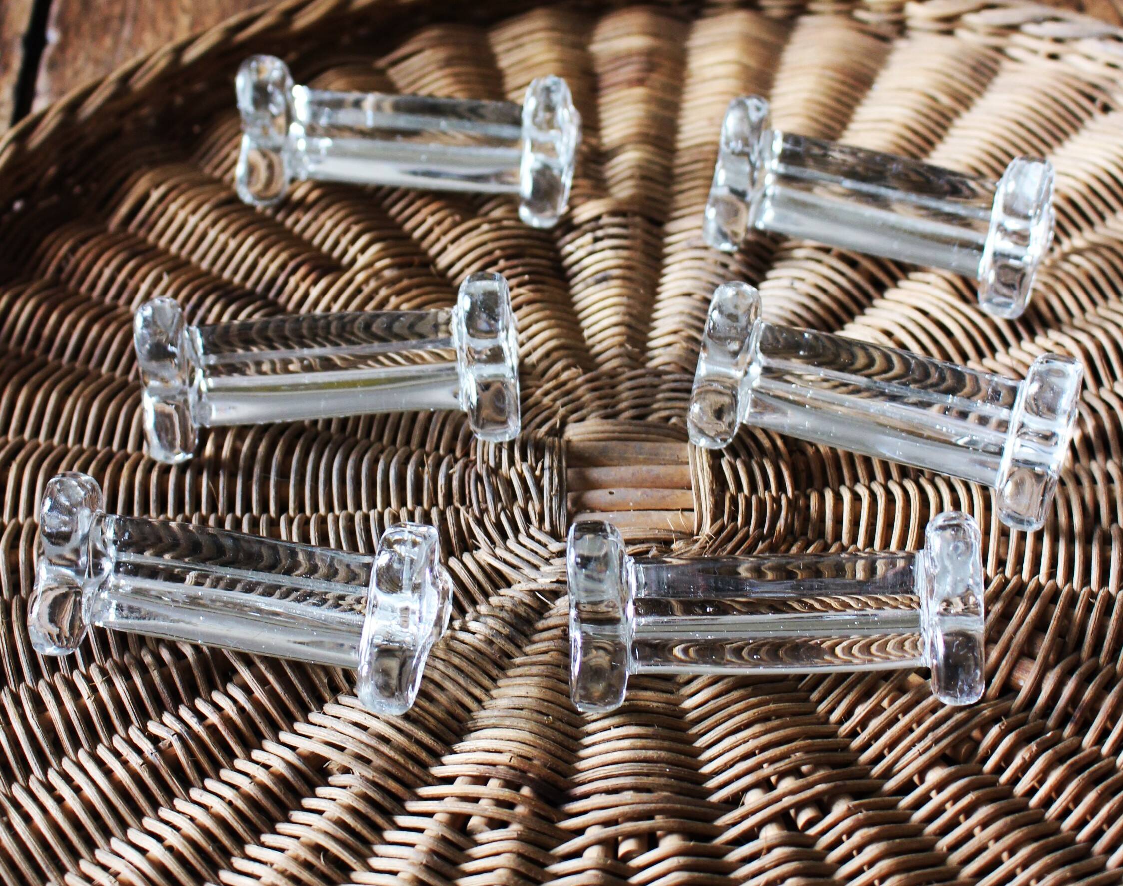 A set of 6 transparent trilobite glass knife rests.