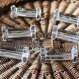 A set of 6 transparent trilobite glass knife rests.