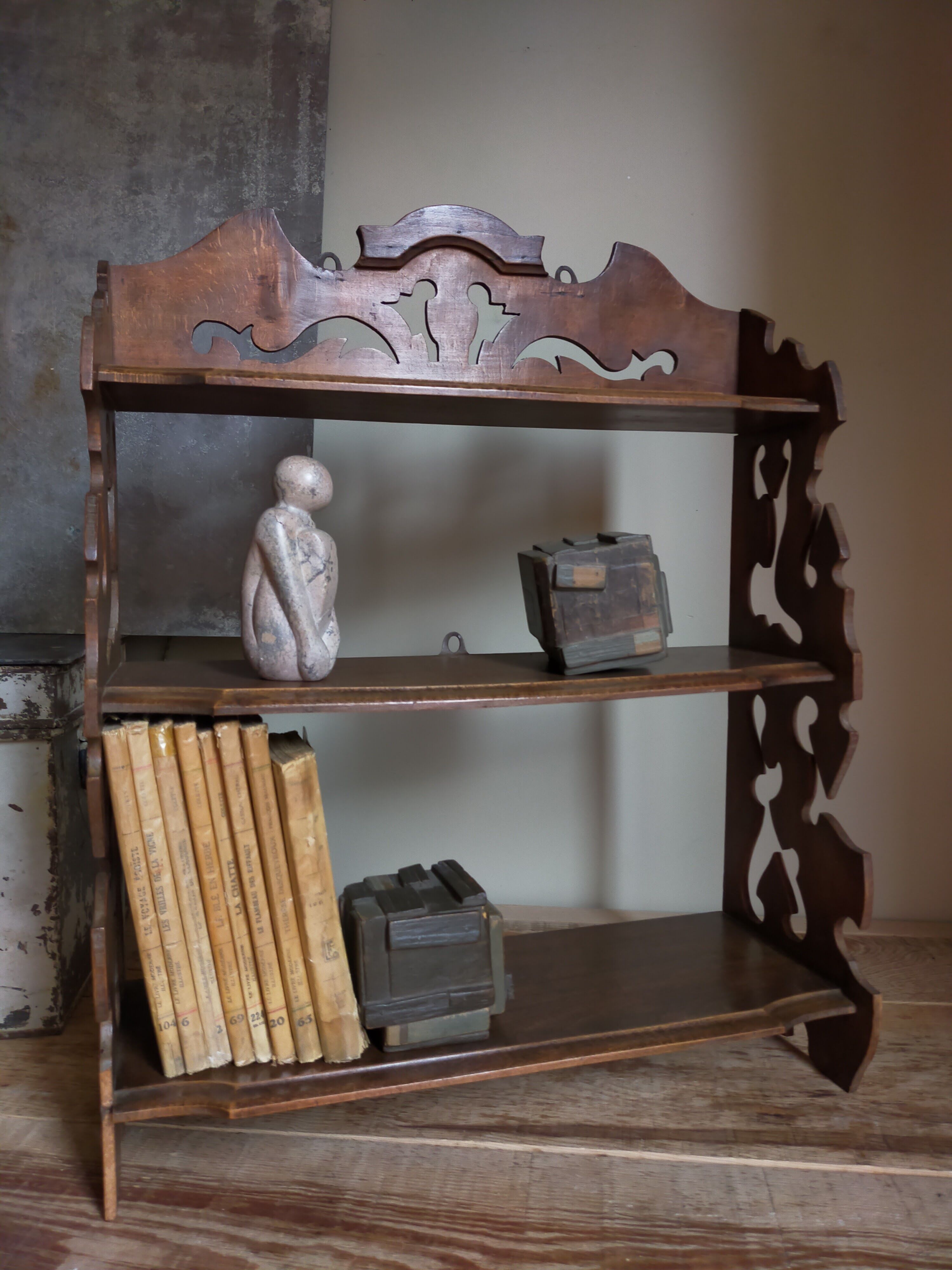 Old carved wooden wall shelf