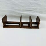 Old bookends in mahogany and modular brass