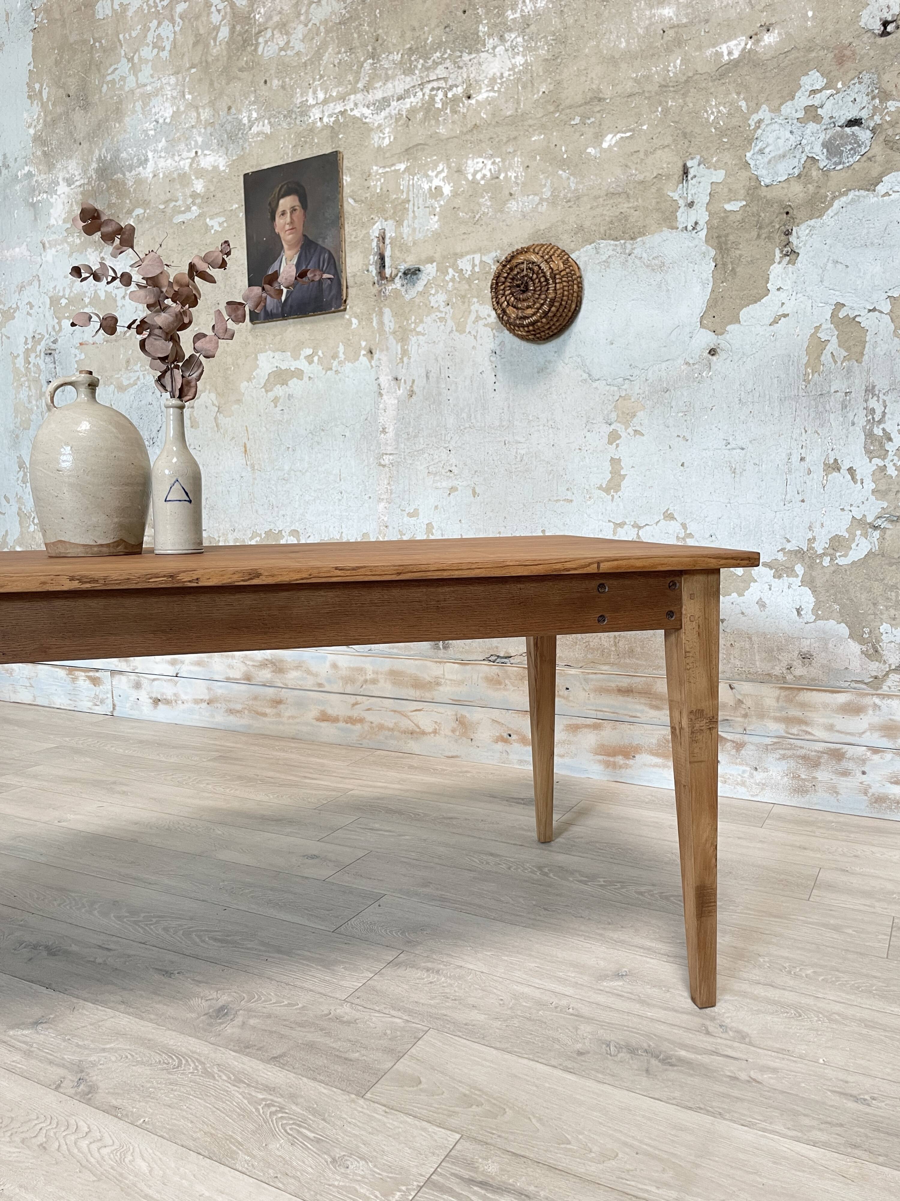 Vintage farm table with spindle legs.