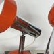 Pair of orange aluminium wall spotlights from the seventies.
