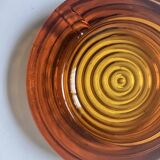 Amber pressed glass ashtray, 1970s design.
