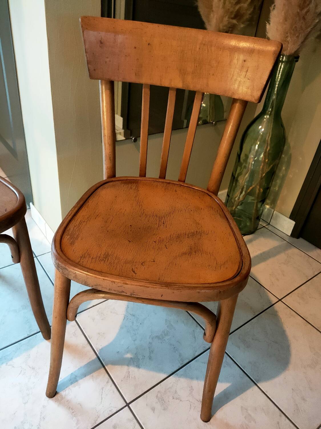 Pair of curved wooden bistro chairs