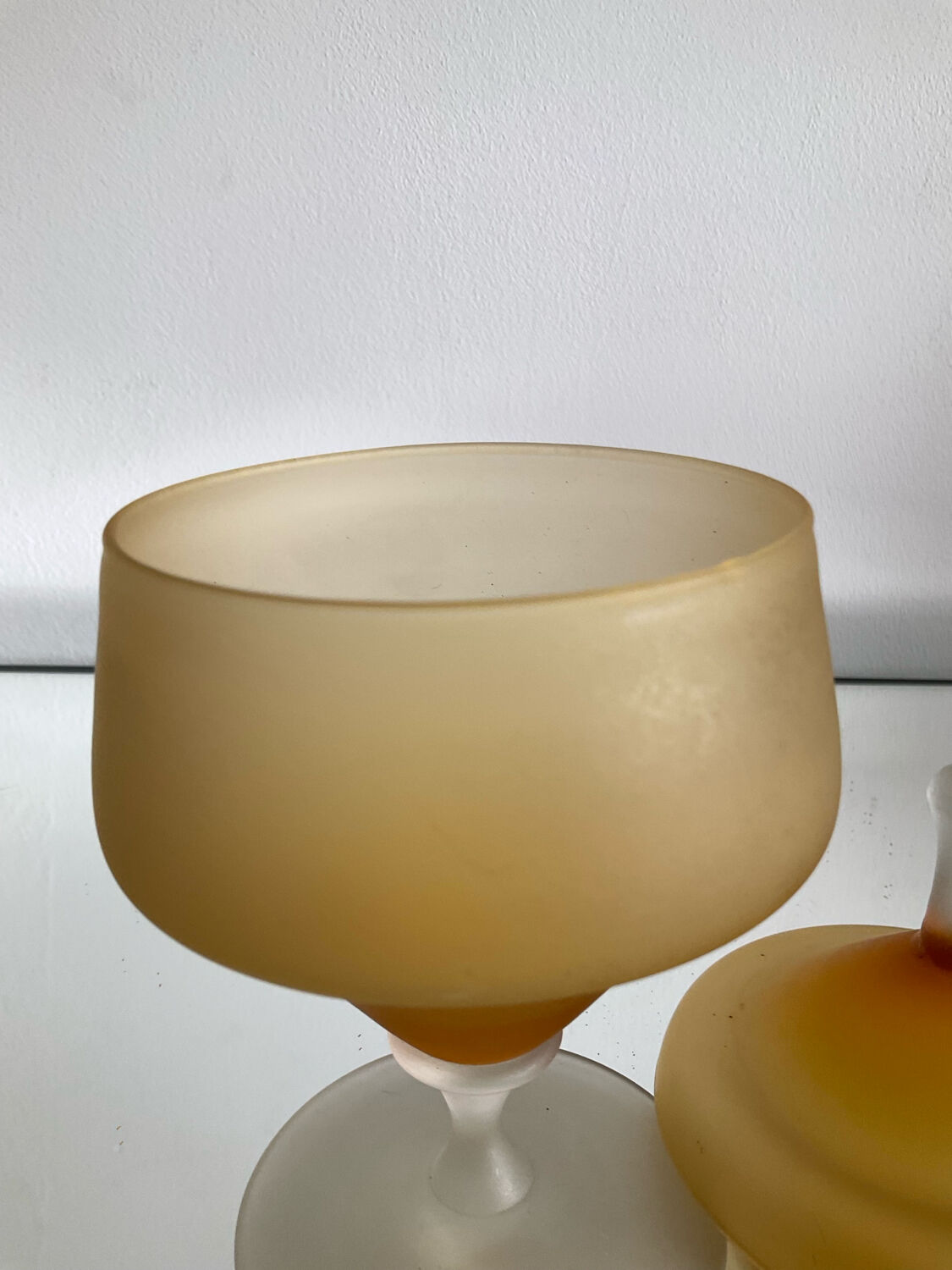 Vintage blown glass candy box on a stand