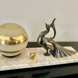 Art deco peacock lamp in regule on marble