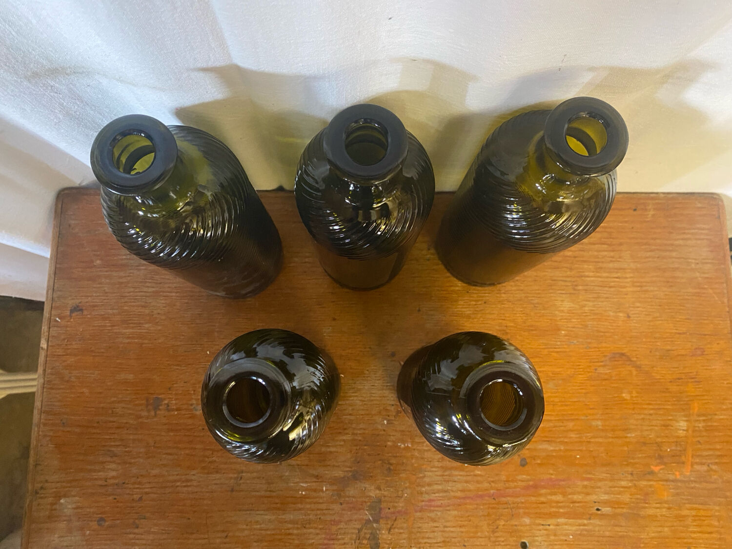 Set of 5 antique carapelli bottles, smoked and ribbed vintage glass