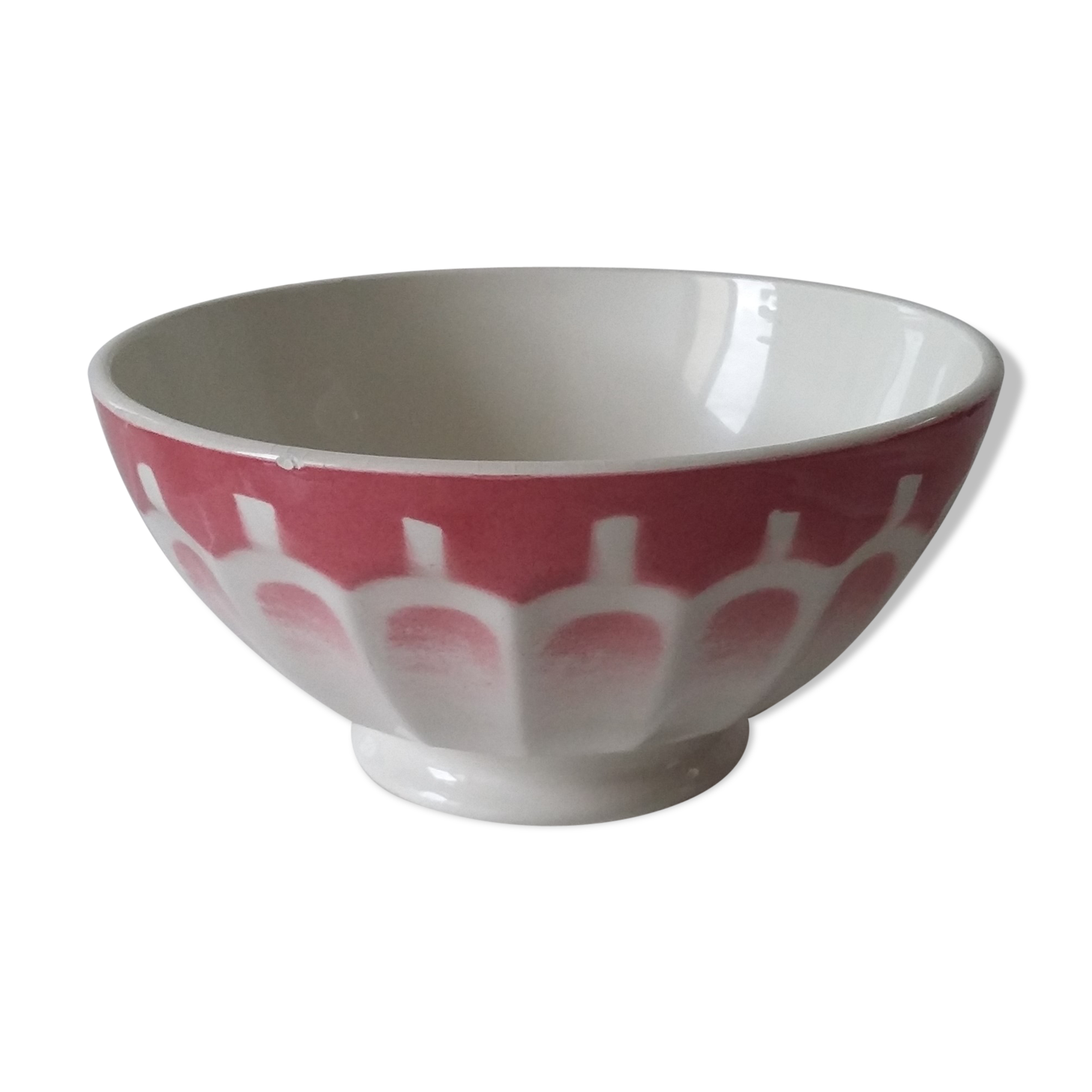 Ancient bowl in pink and white earthenware