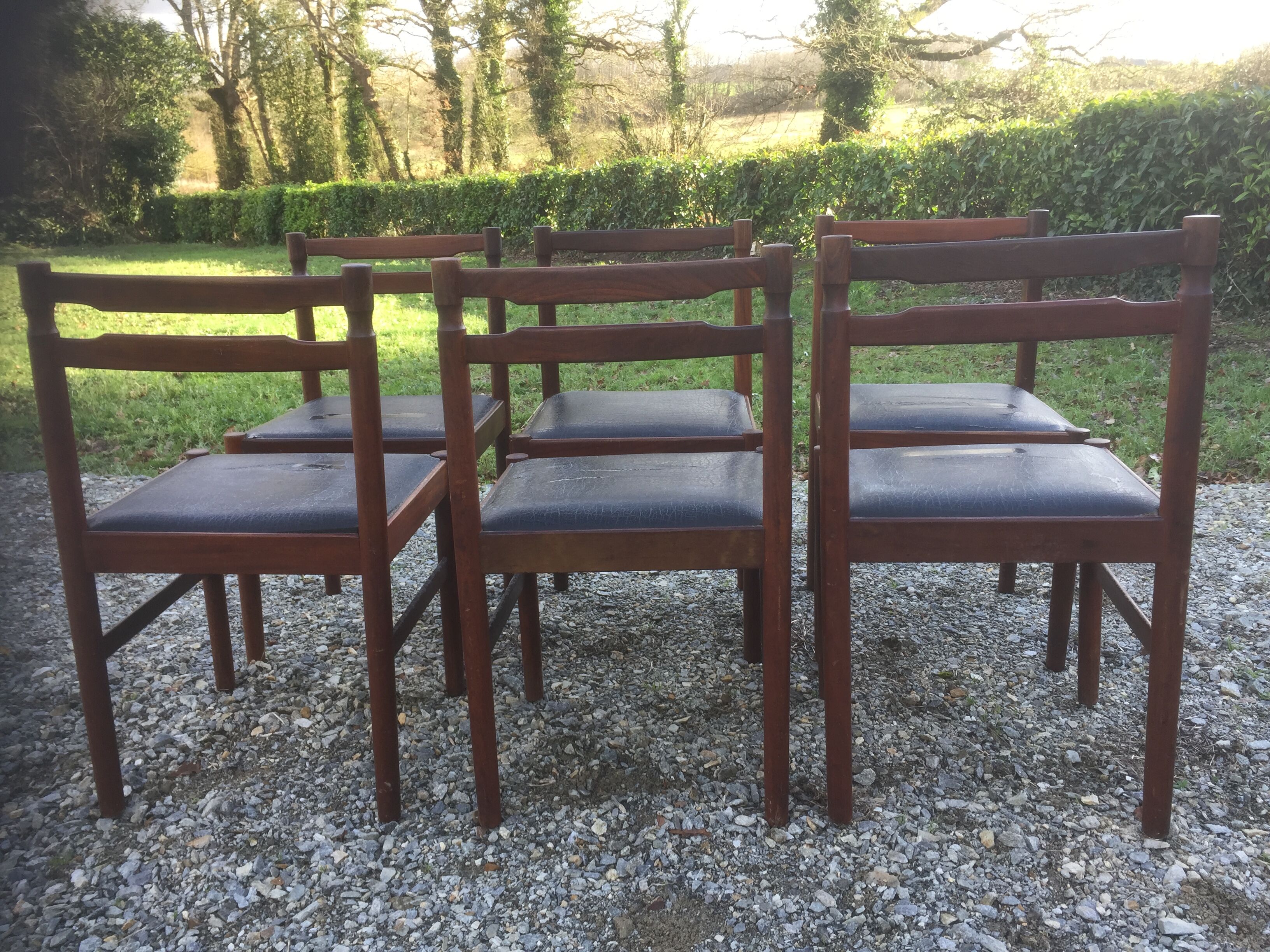 Vintage scandinavian teak chairs, black skaï seats as it is