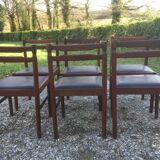 Vintage scandinavian teak chairs, black skaï seats as it is