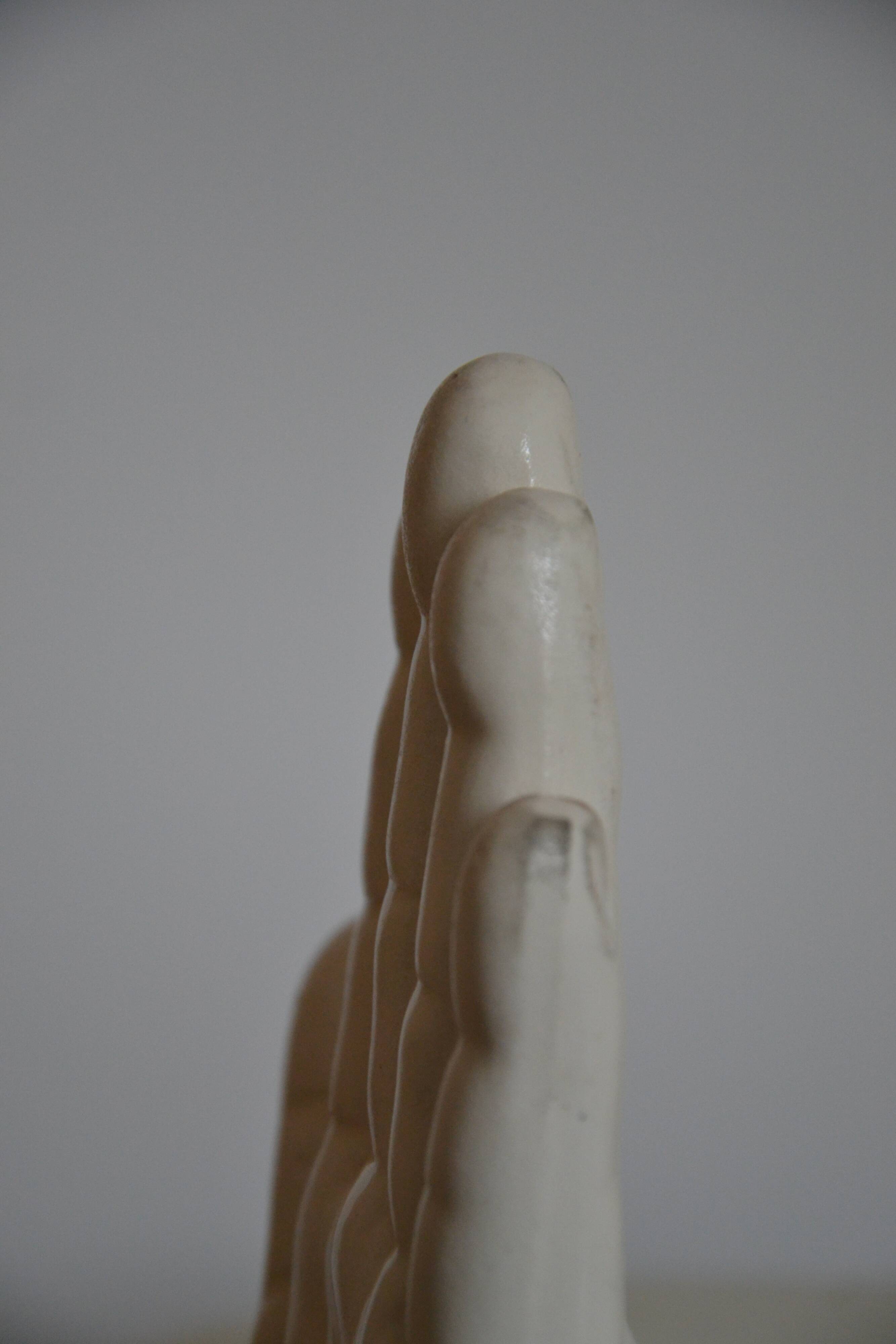 Handends in the shape of vintage white ceramic