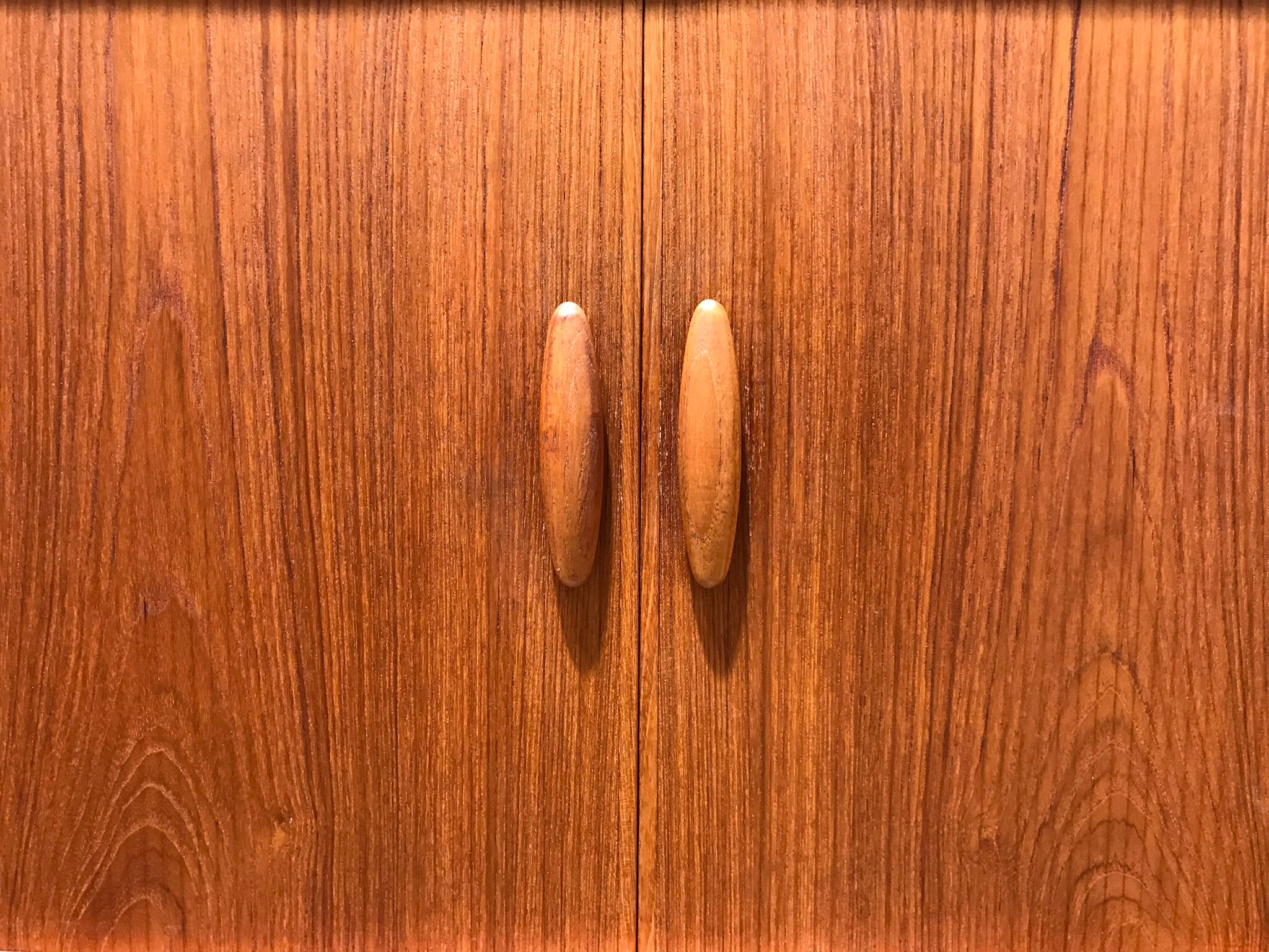 Teak wall system by Niels Bach for Dyrlund, 1970