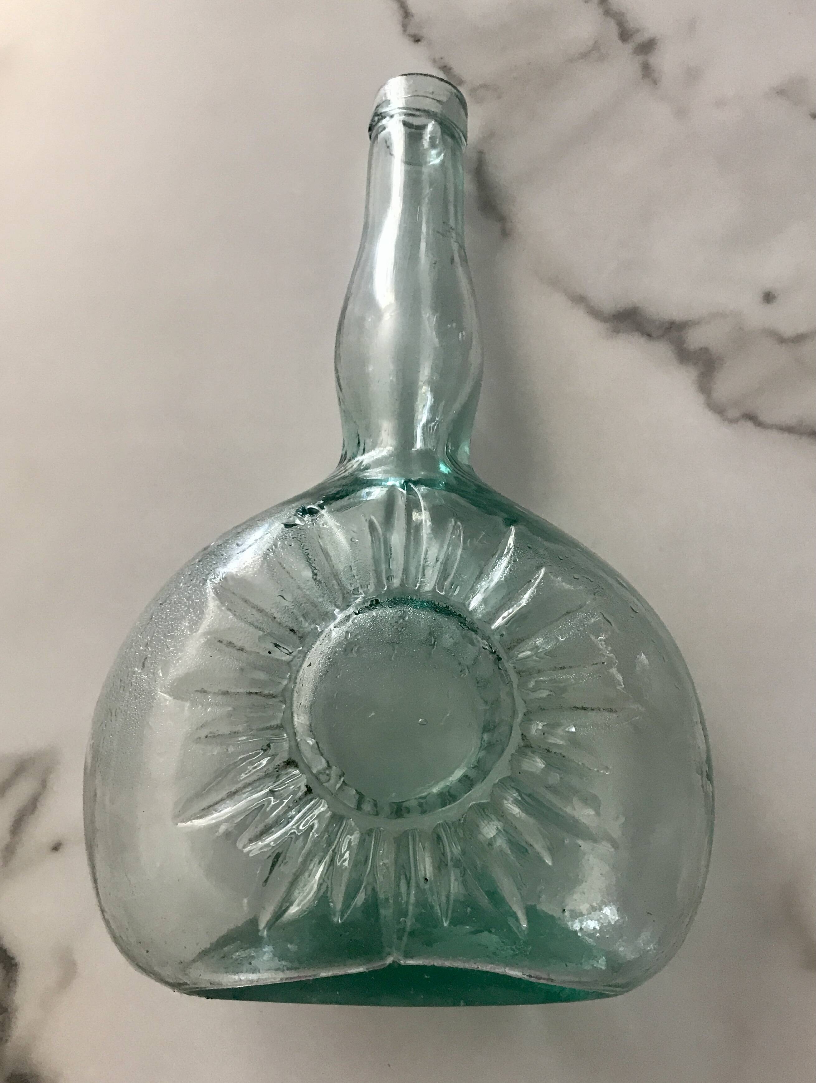 Bouteille vintage embossage soleil
