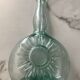 Bouteille vintage embossage soleil