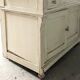 Antique wooden bathroom cabinet with painted finish and white marble.