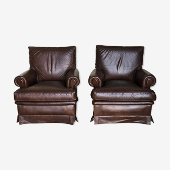 Pair of vintage leather armchairs
