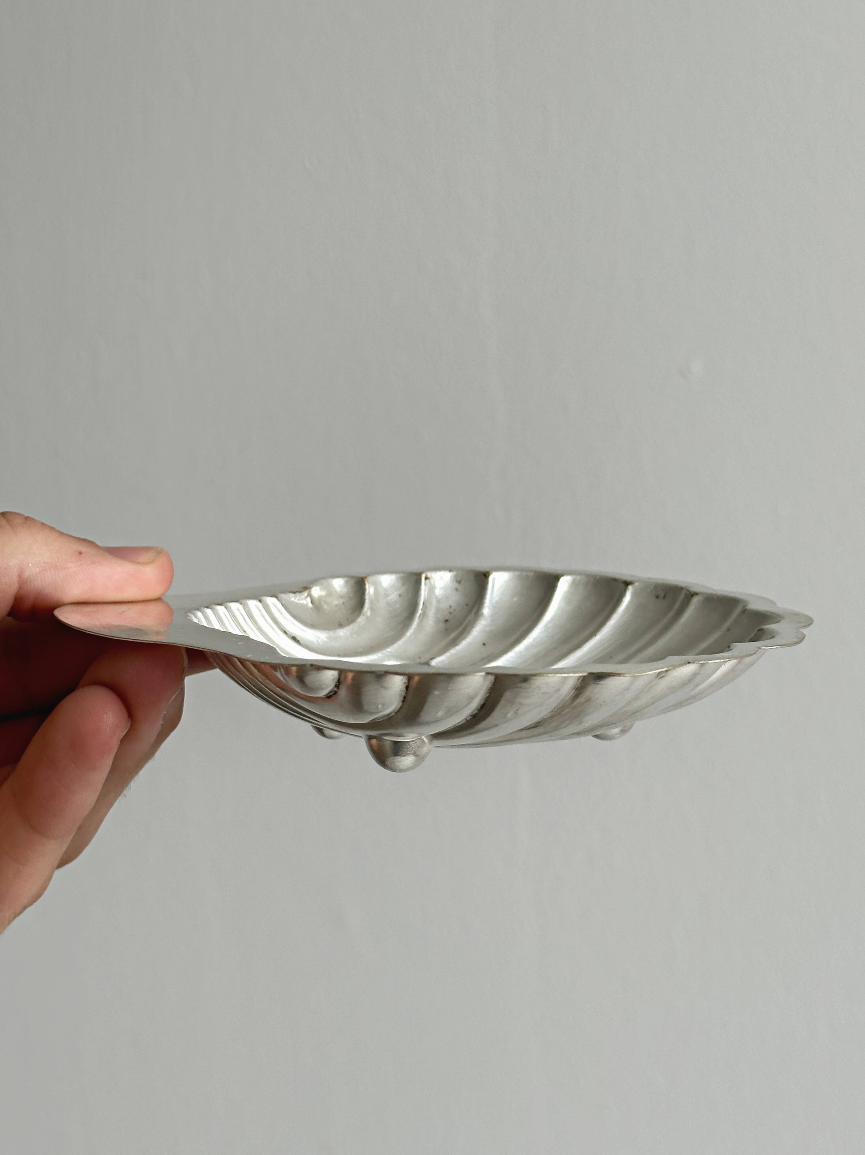 Pair of silver shell bowls