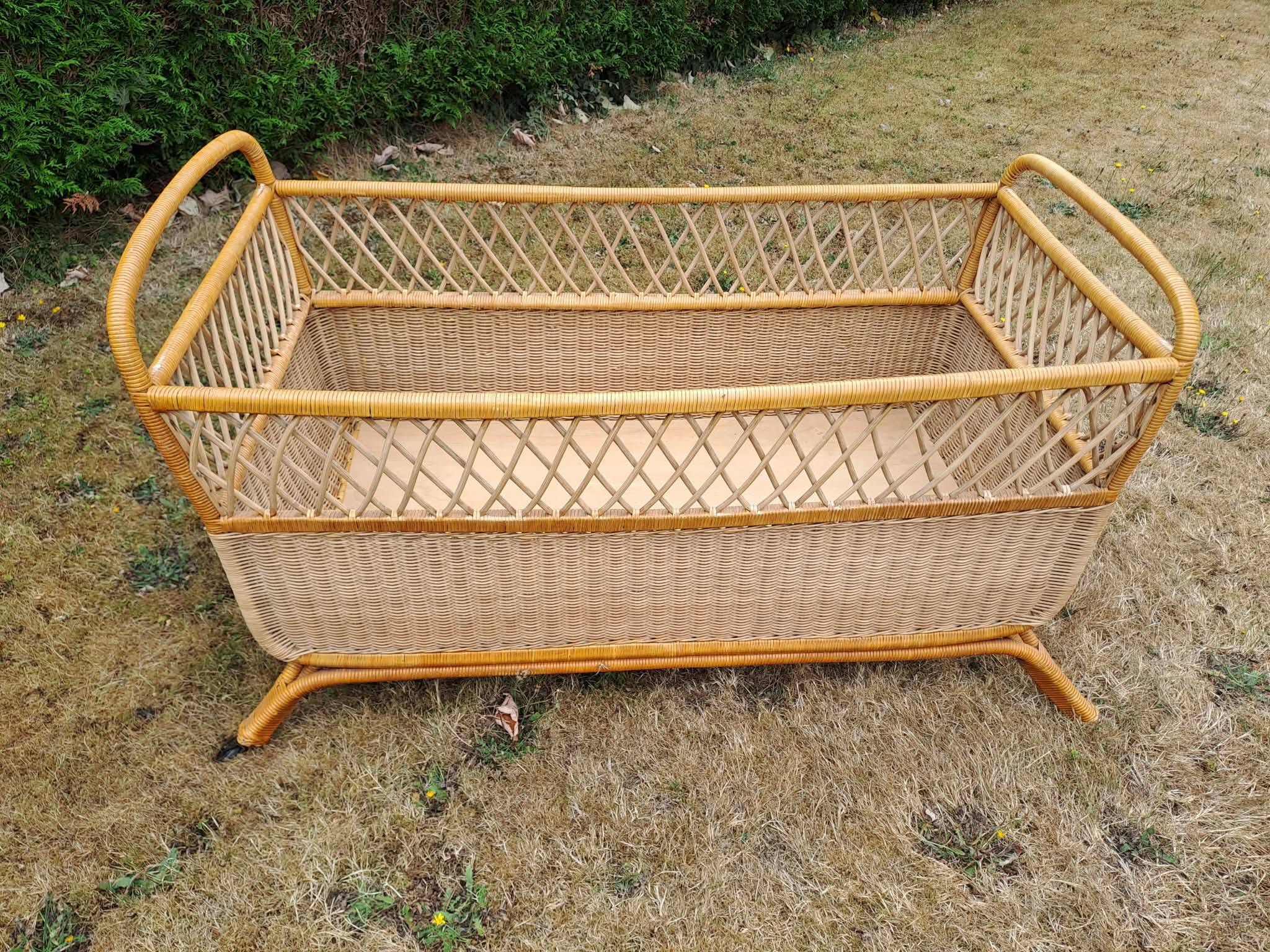 Rattan cradle.