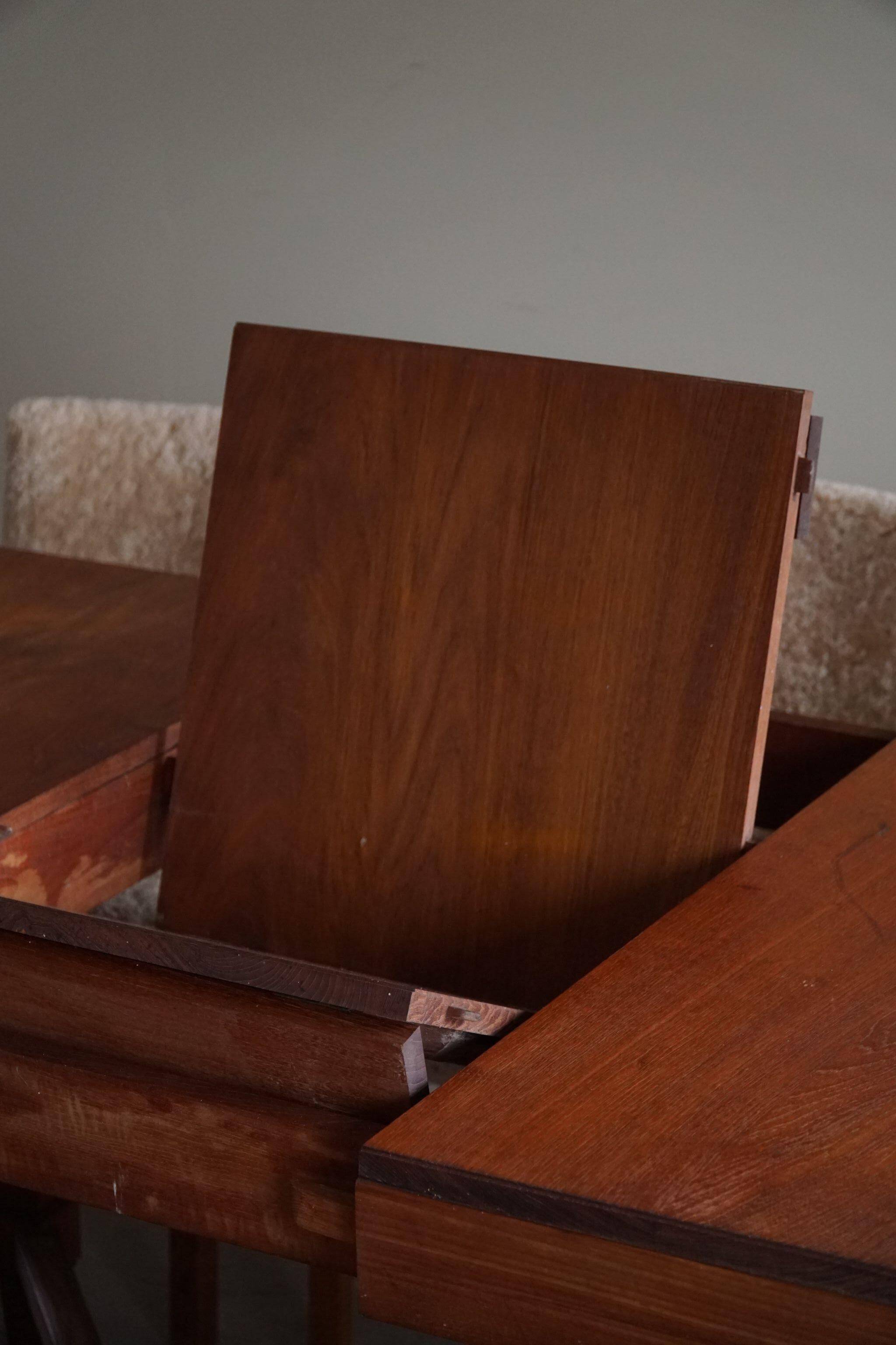 Art Deco dining table in teak, with butterfly extension, Danish cabinetmaker, 1940s.