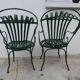 Pair of wrought iron garden chairs by François Carre