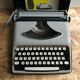Old writing machine polyjo super 75 bakelite grey + vintage black trunk