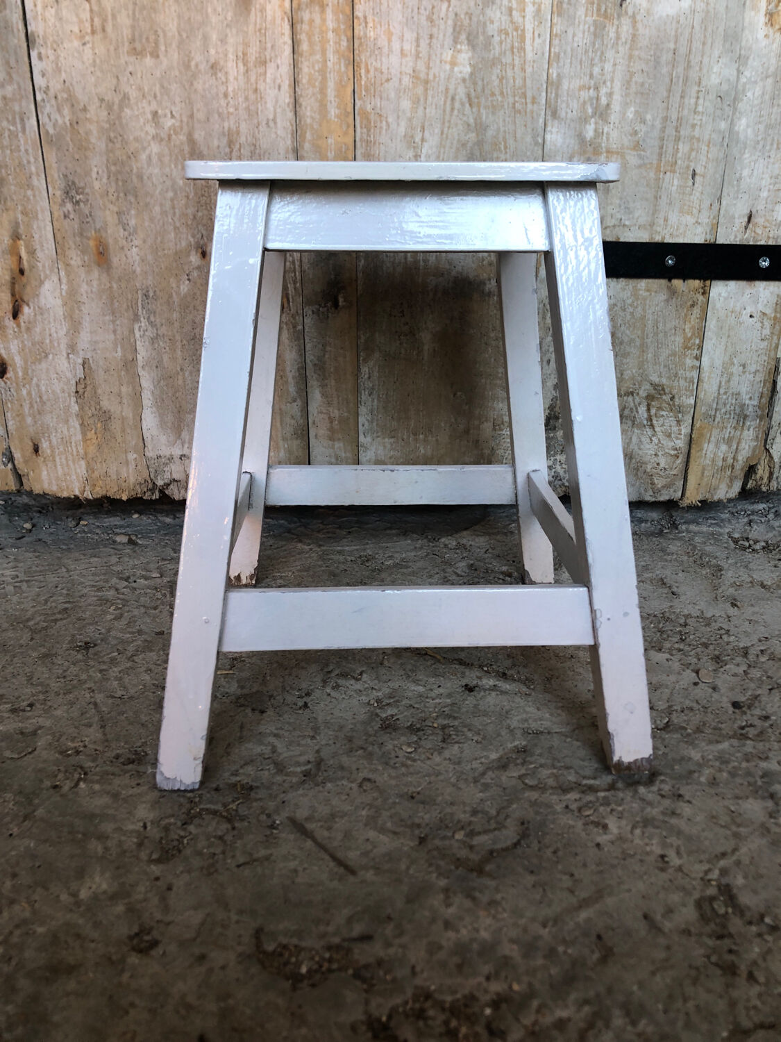 Vintage white wood milking stool