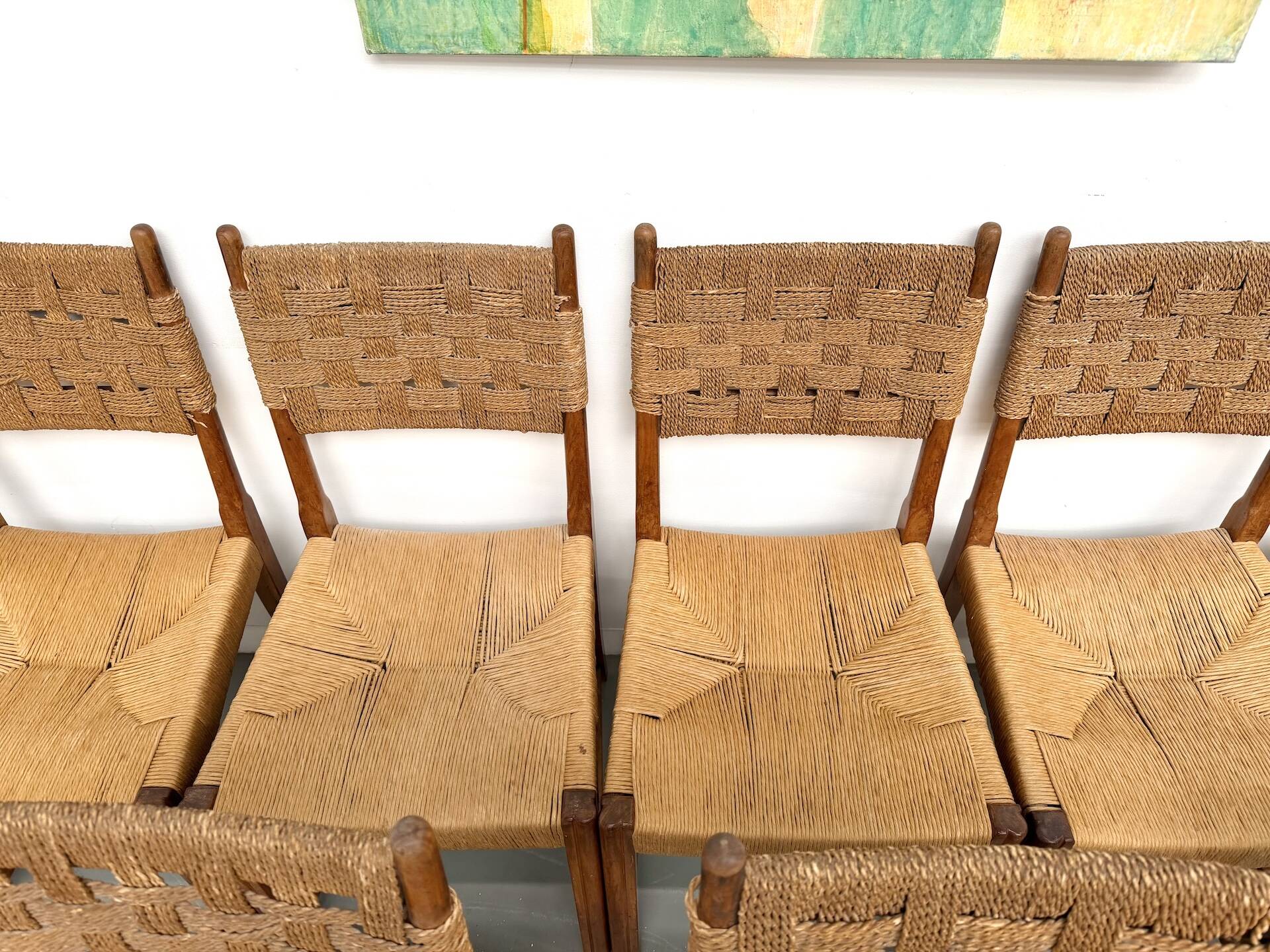 Série de dix chaises en orme massif tressées main, France circa 1965