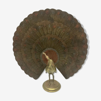 Peacock figure in vintage brass