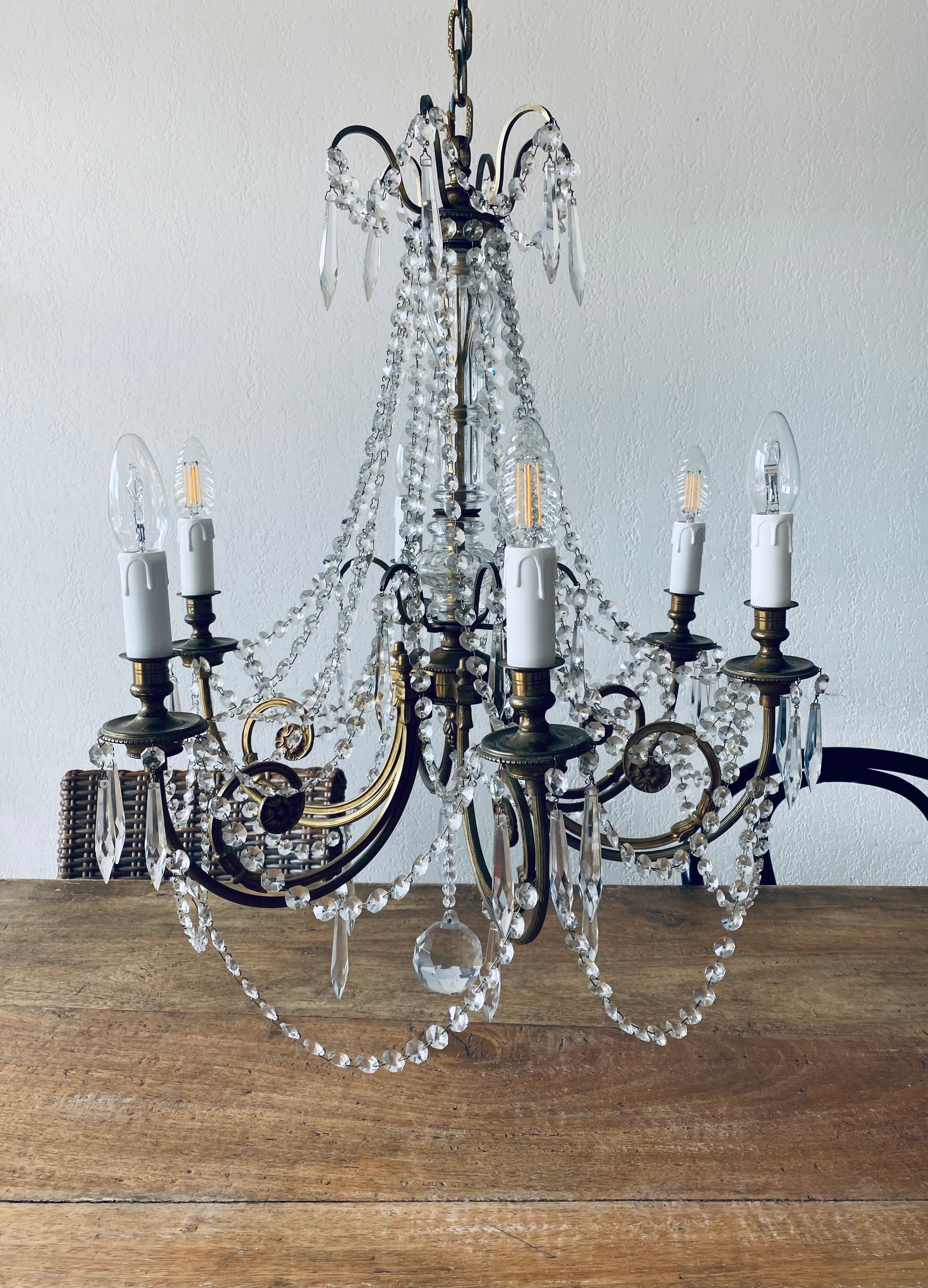 Chandelier with crystal and bronze tassels