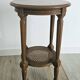 Antique marquetry side table in wood and cane.
