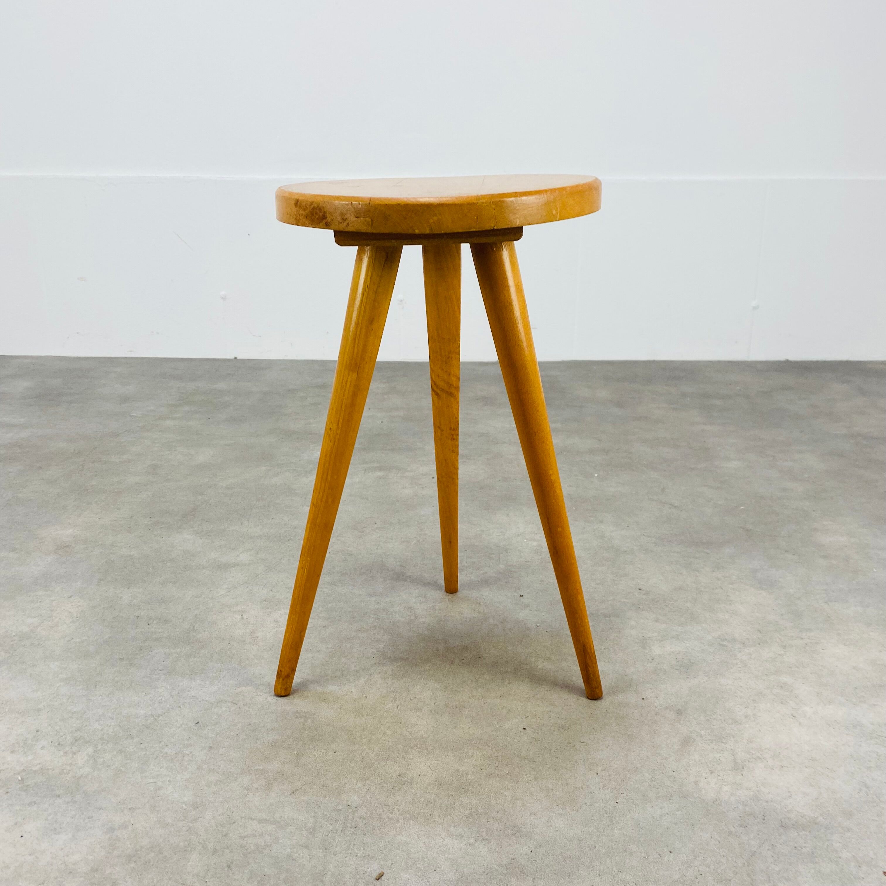 Vintage blond wood tripod stool