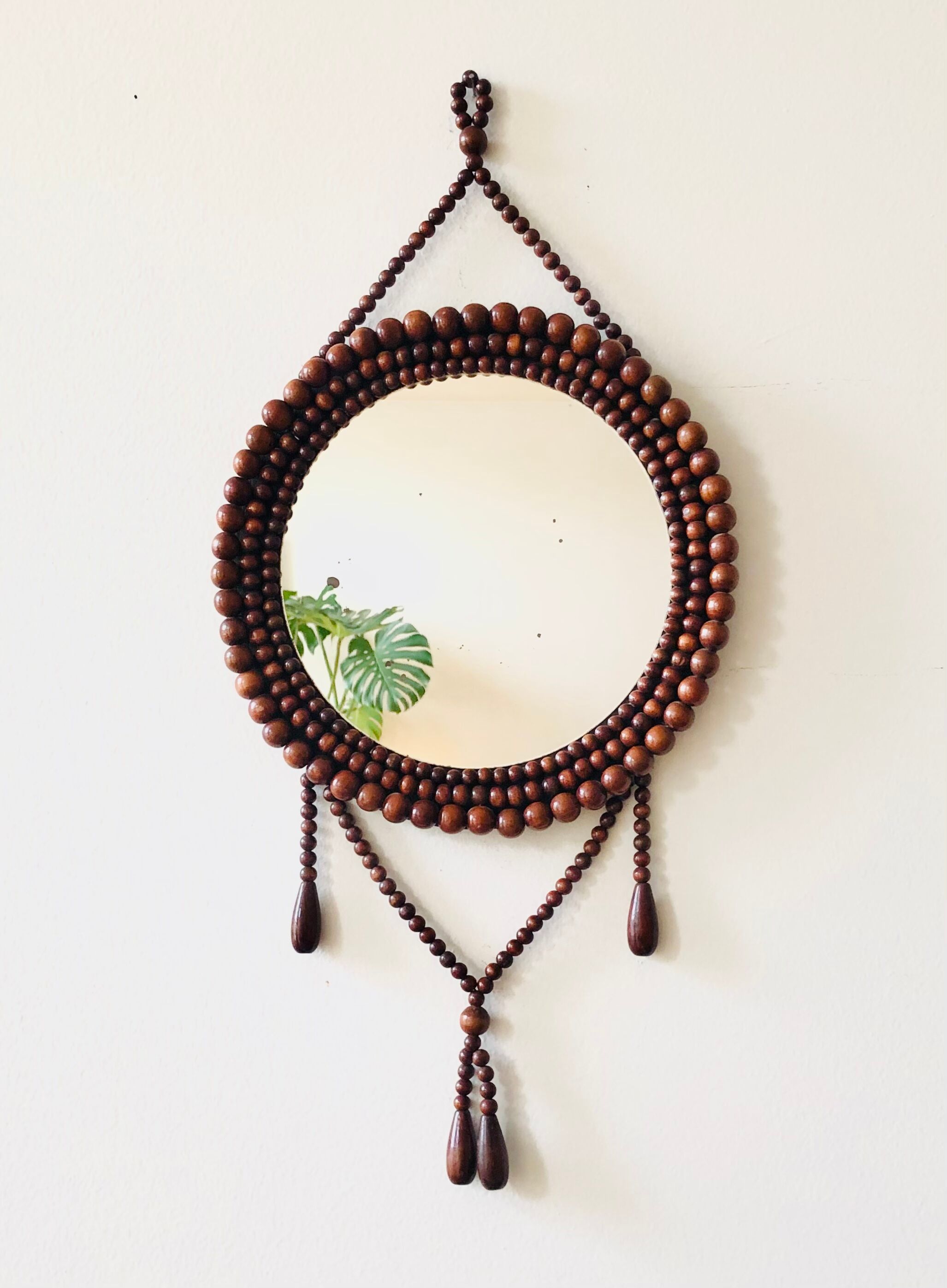 Miroir mural vintage en perles de bois