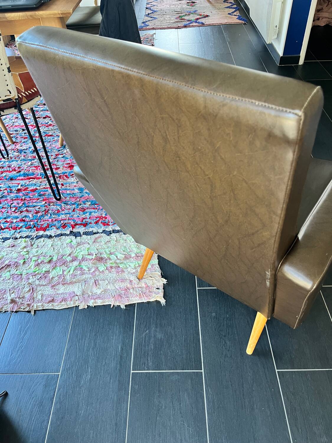 Vintage brown faux leather armchair from the 60s/70s.