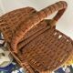 Brown woven vintage wicker basket with 2 lids.