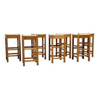 set of seven rattan and wood barstools