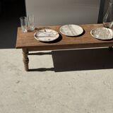 Tray, circular dish or plate made of white striped grey petrified wood.