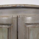 Rustic patinated corner cupboard