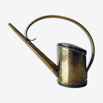 Old brass watering can