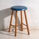 Antique wooden stool with a round seat – Central Europe, around 1950