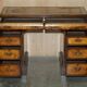 Victorian antique partner's desk in veined walnut with a leather top.