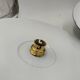 Suspensions in enamelled sheets