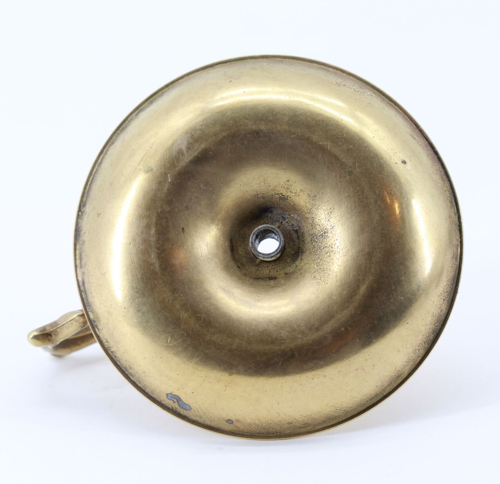 Old brass hand candle holder