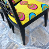 Pair of chairs upholstered with wax fabric
