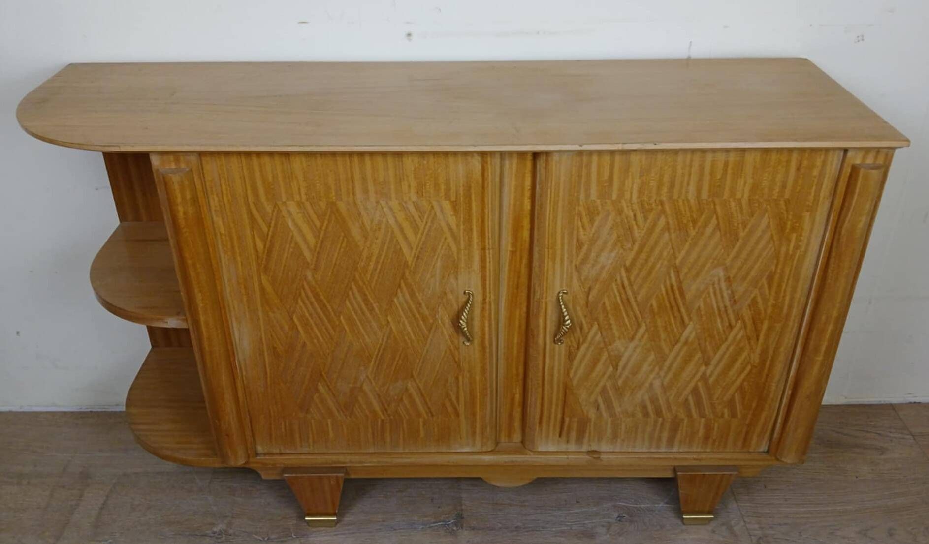 According to Jules Leleu: Rare corner sideboard in light wood, Art Deco period, circa 1930